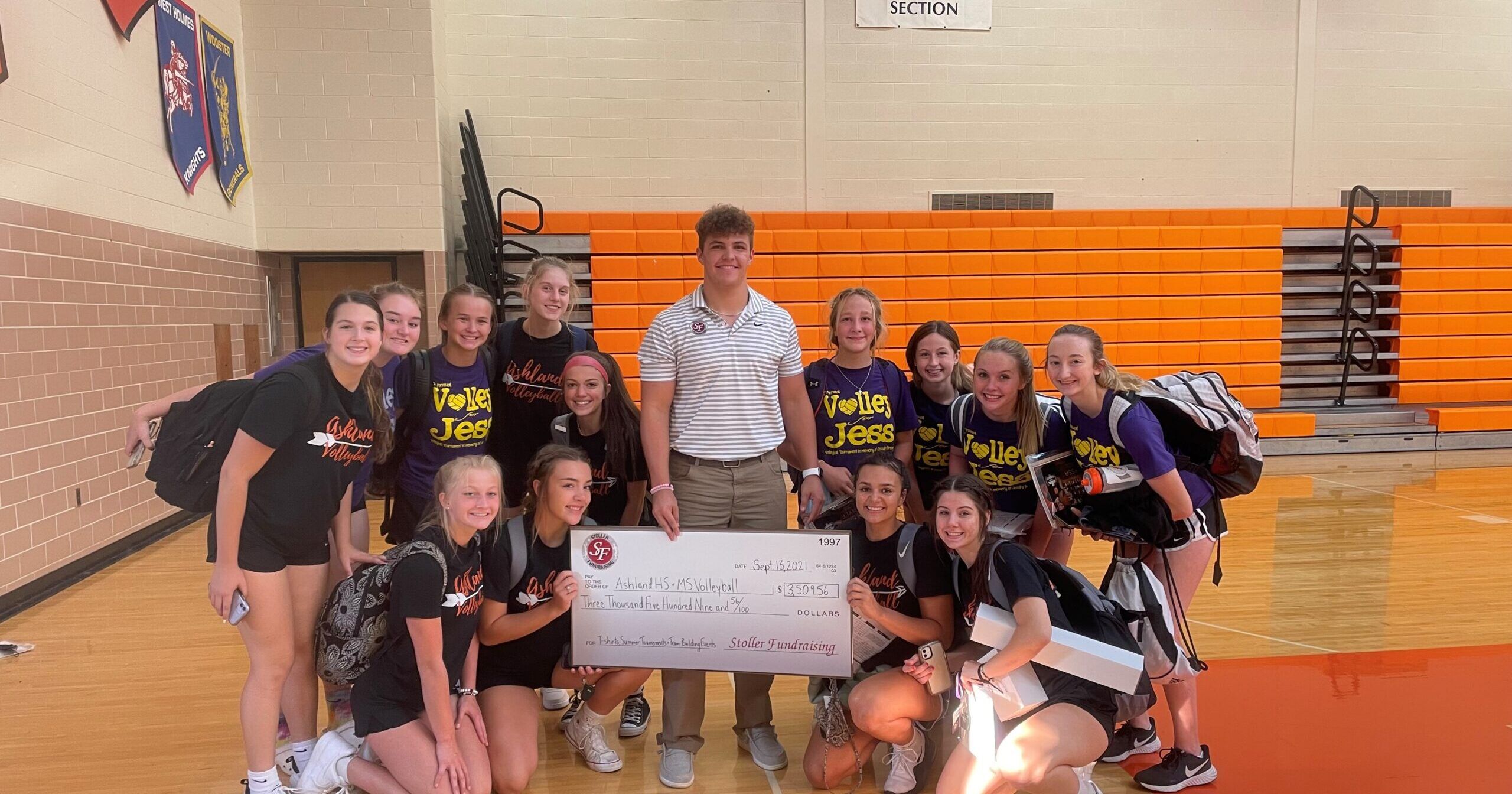Ashland volleyball fundraising delivery check